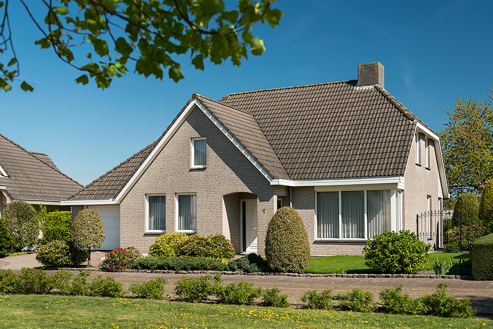De achtertuin van een landhuis in Uden